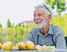 Man smiles on sunny day