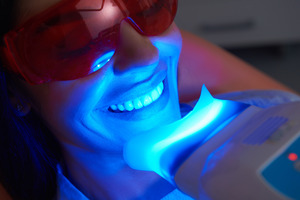 Someone getting teeth whitening